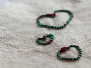 3 hearts embroidered using machine couching